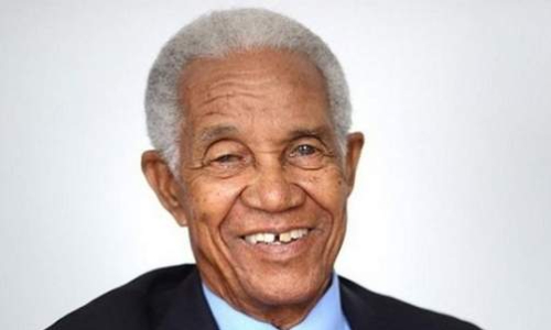 Sobers congratulates Holder for his Beaver-trick